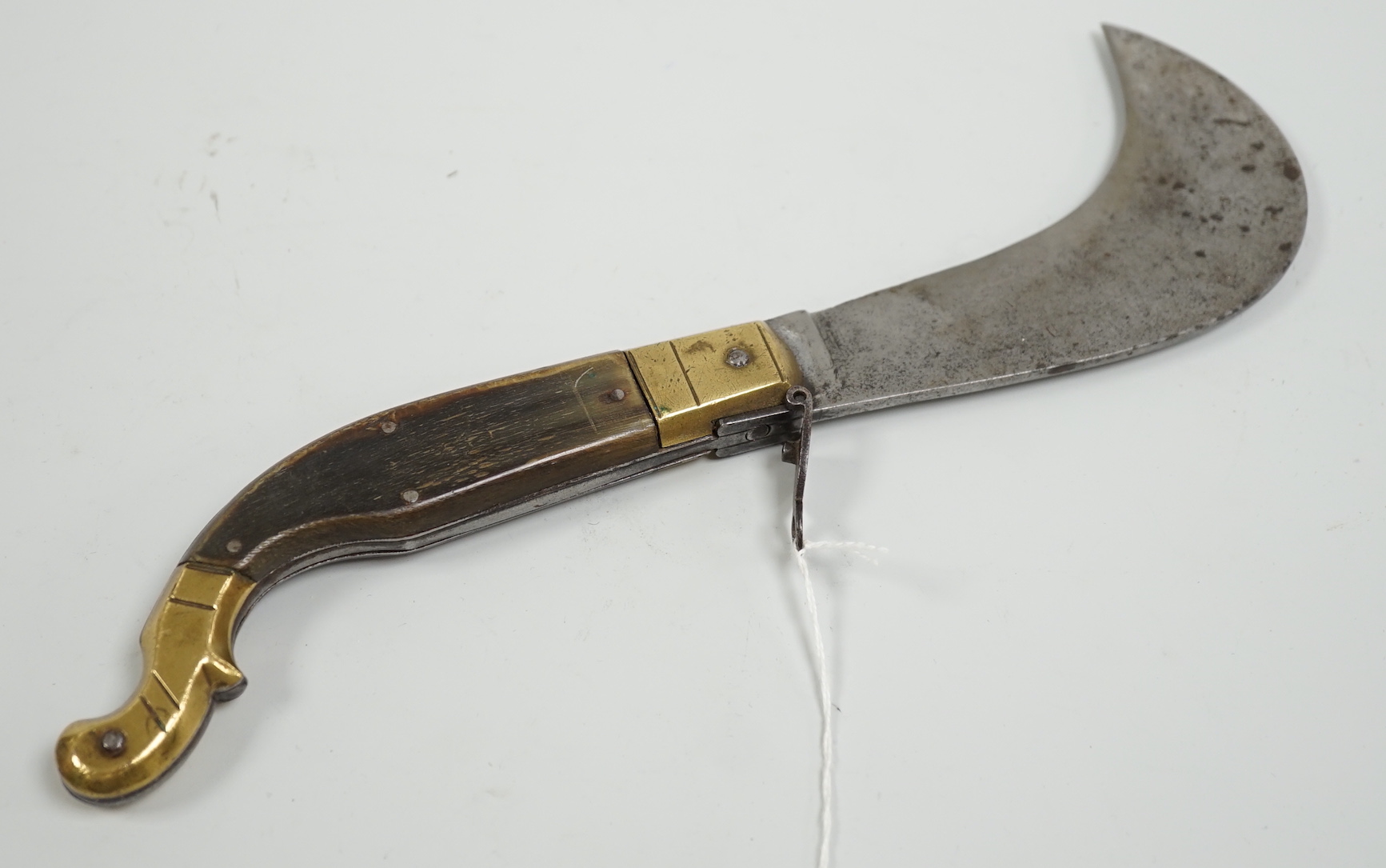 A Whitby folding bill nosed knife and leather case, 28cm long (unfolded)